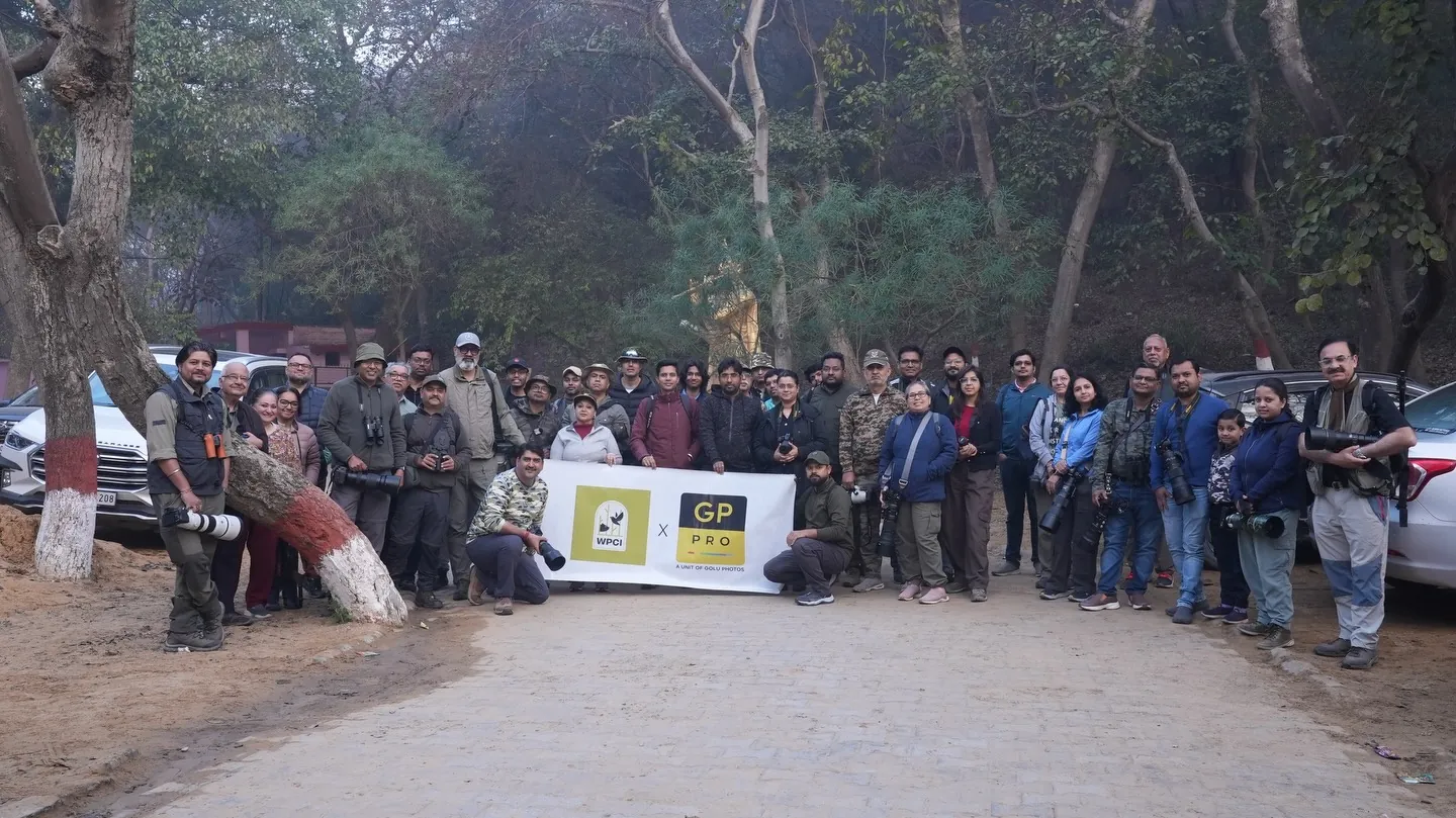 WPCI members gathered with cameras at a bird walk in Surajpur